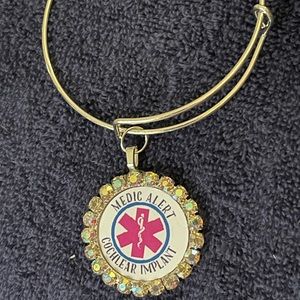 Cochlear implant alert bracelet